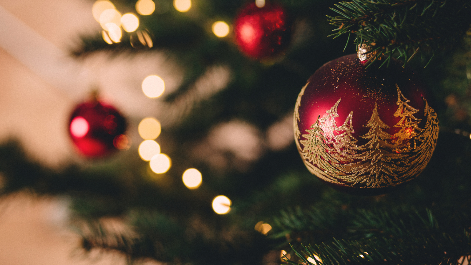 Christmas bauble with lights and tree